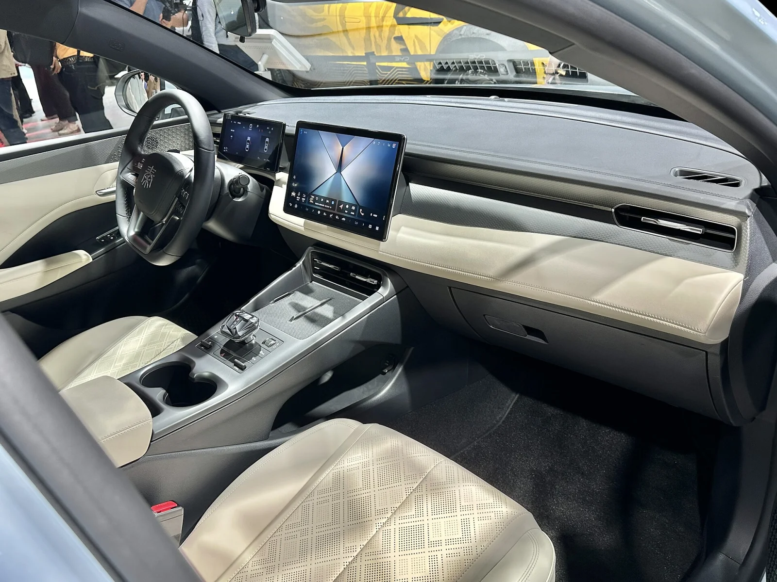 BYD Qin PLUS DM-i 2026 Model cockpit interior with central touchscreen, digital cluster and two-tone seats